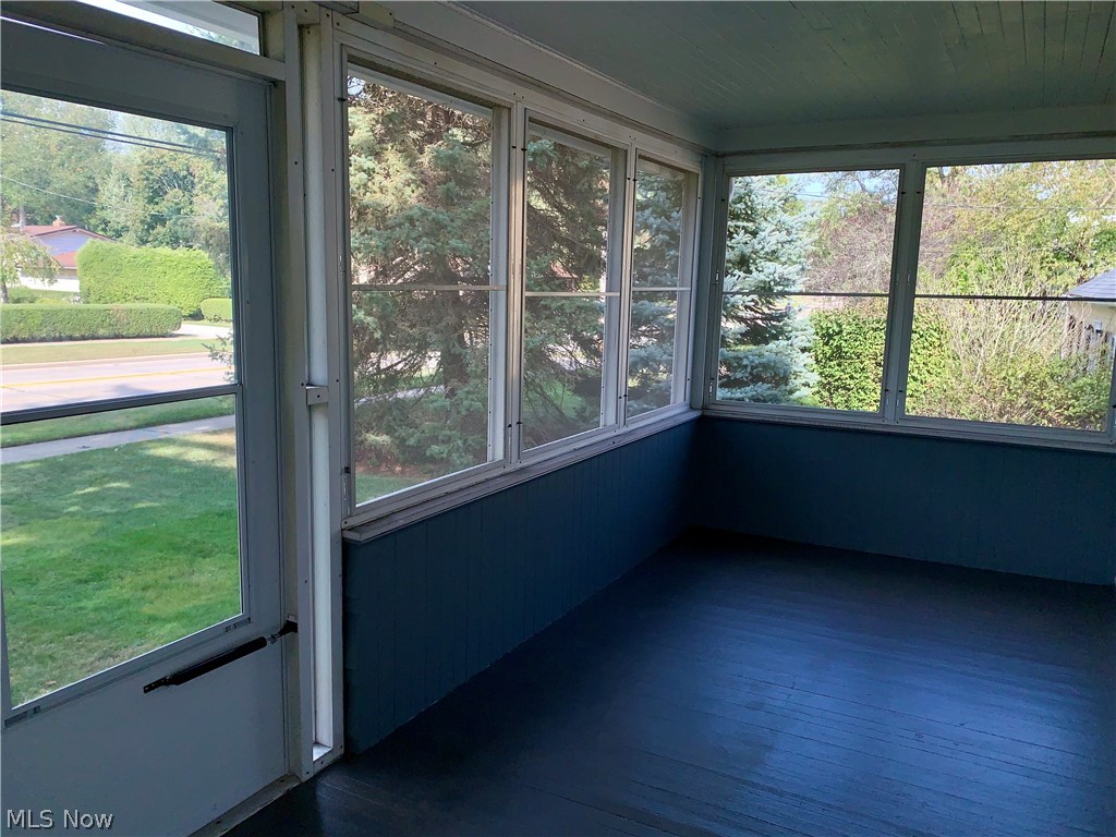 5469 Kennedy Ridge Road North Olmsted, OH 44070 - Photo 3 of 19 Your screened-in front porch