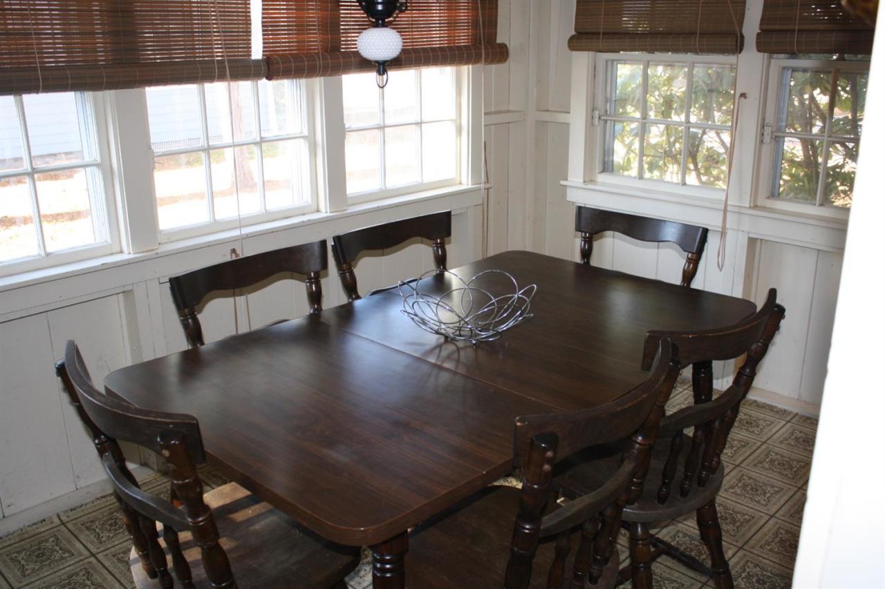 30 Longell Road Dennis Port, MA 02639 - Photo 14 of 19 a view of a dining room with furniture and window