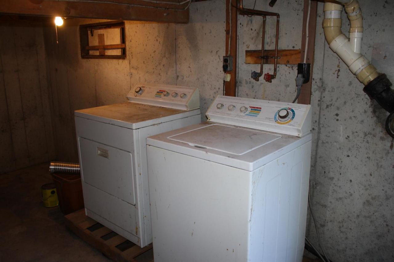30 Longell Road Dennis Port, MA 02639 - Photo 16 of 19 a utility room with dryer and washer