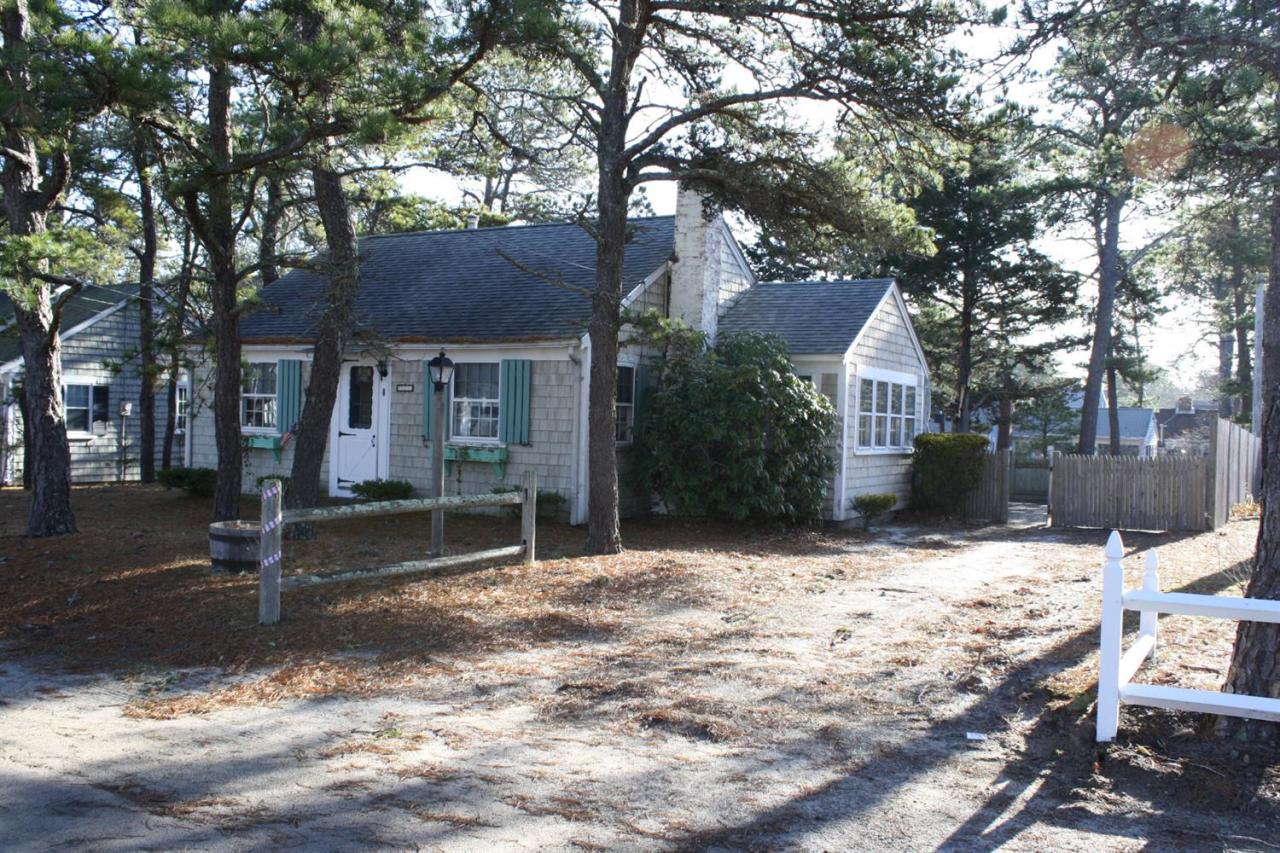 30 Longell Road Dennis Port, MA 02639 - Photo 2 of 19 a view of house with yard covered in snow