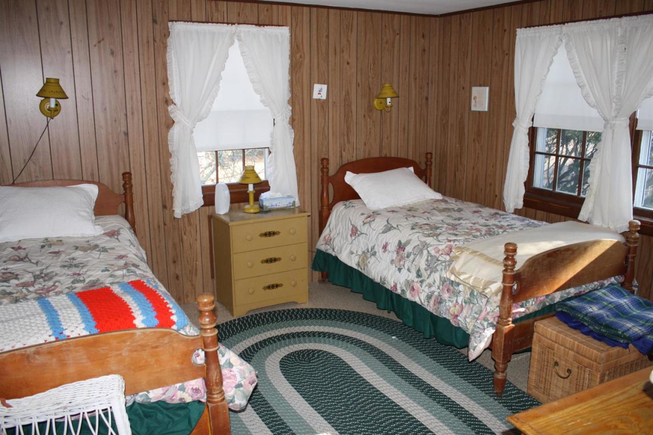 30 Longell Road Dennis Port, MA 02639 - Photo 9 of 19 a bedroom with a bed and a dresser