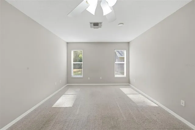 a bathroom with a shower and a toilet
