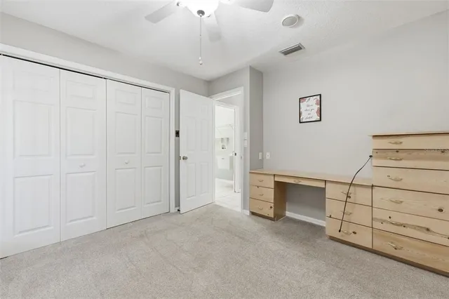 a bathroom with a sink toilet and a mirror