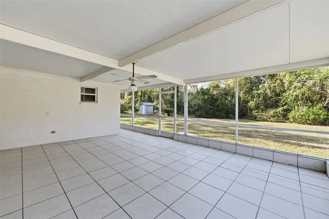 a big room with closet and windows