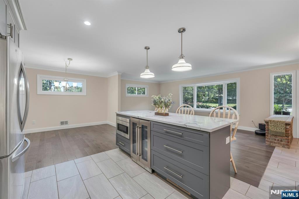 82 Little Falls Road Cedar Grove, NJ 07009 - Photo 13 of 36 a kitchen with a stove and a sink