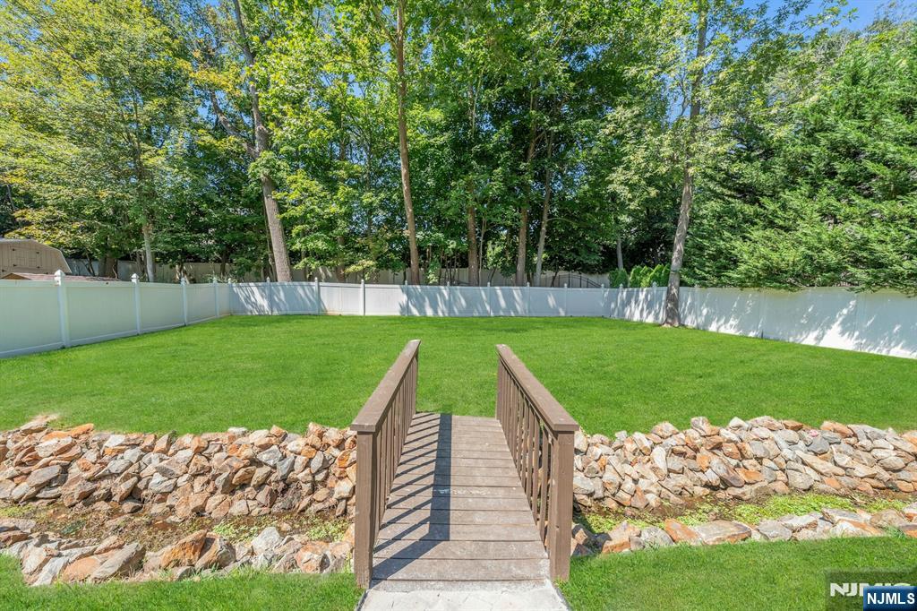 82 Little Falls Road Cedar Grove, NJ 07009 - Photo 27 of 36 a view of a park with large trees