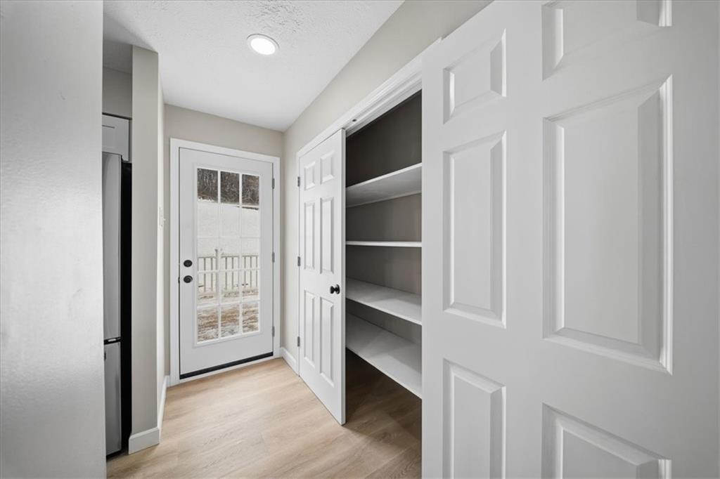 214 McCleary Road Aliquippa, PA 15001 - Photo 12 of 29 a view of an empty room with cabinet and entryway