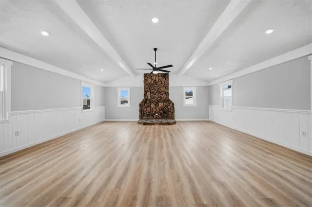 a very nice looking room with wooden floor