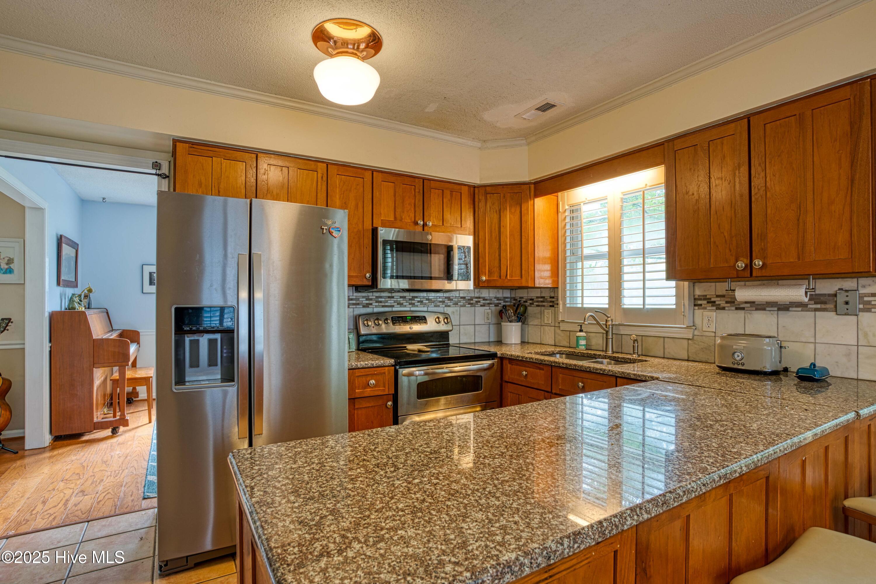 5463 Eastwind Road Wilmington, NC 28403 - Photo 11 of 28 5436 Eastwinf-22