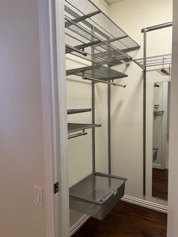 a bathroom with a toilet sink and shower