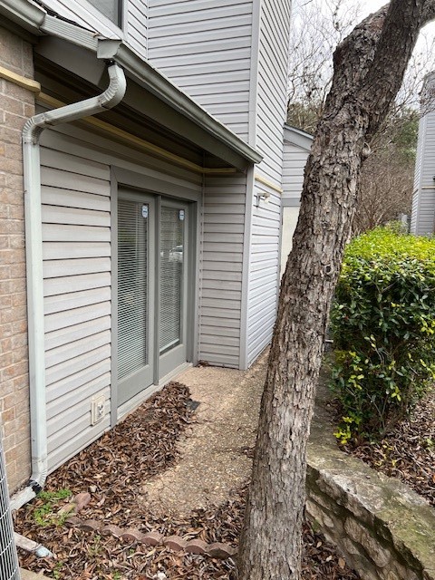 802 South 1st Street, Unit 117 Austin, TX 78704 - Photo 27 of 31 a view of a house with a yard