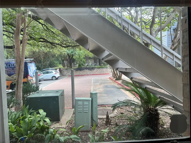 a view of swimming pool with outdoor seating and yard