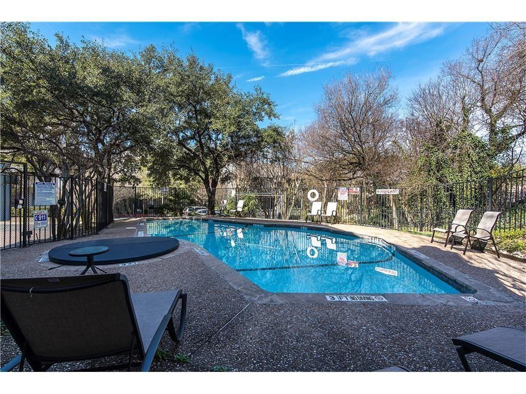 802 South 1st Street, Unit 117 Austin, TX 78704 - Photo 29 of 31 a view of a swimming pool with an outdoor space and seating area
