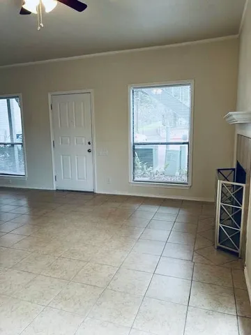 an empty room with windows