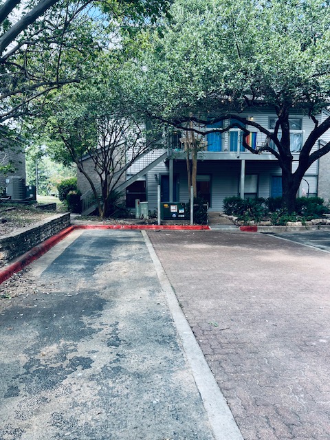 802 South 1st Street, Unit 117 Austin, TX 78704 - Photo 31 of 31 a view of a building with trees