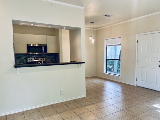 802 South 1st Street, Unit 117 Austin, TX 78704 - Photo 8 of 31 a view of kitchen with cabinets and furniture