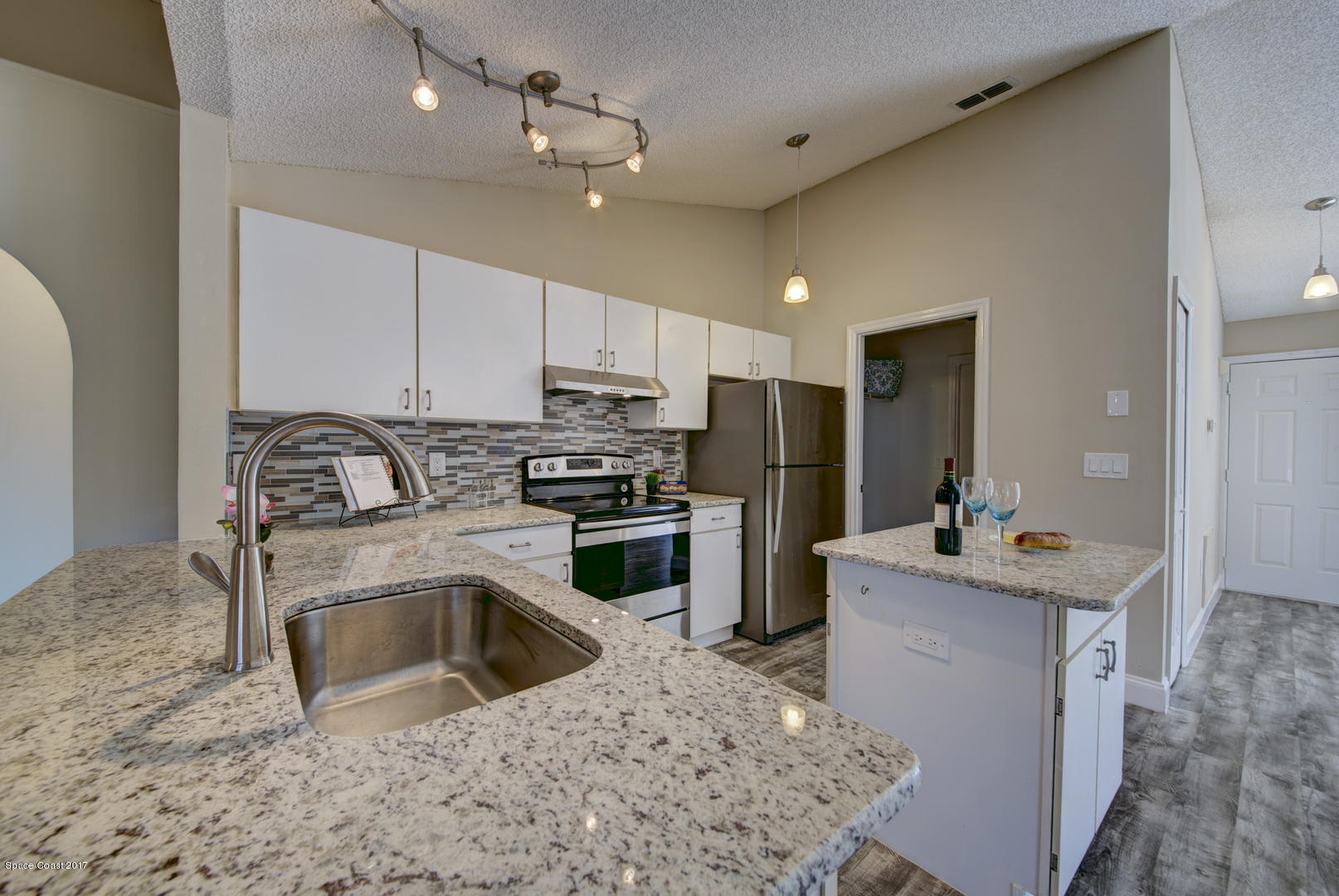 1227 Danforth Street Southwest Palm Bay, FL 32908 - Photo 14 of 42 Kitchen with Stainless Steel Appliances