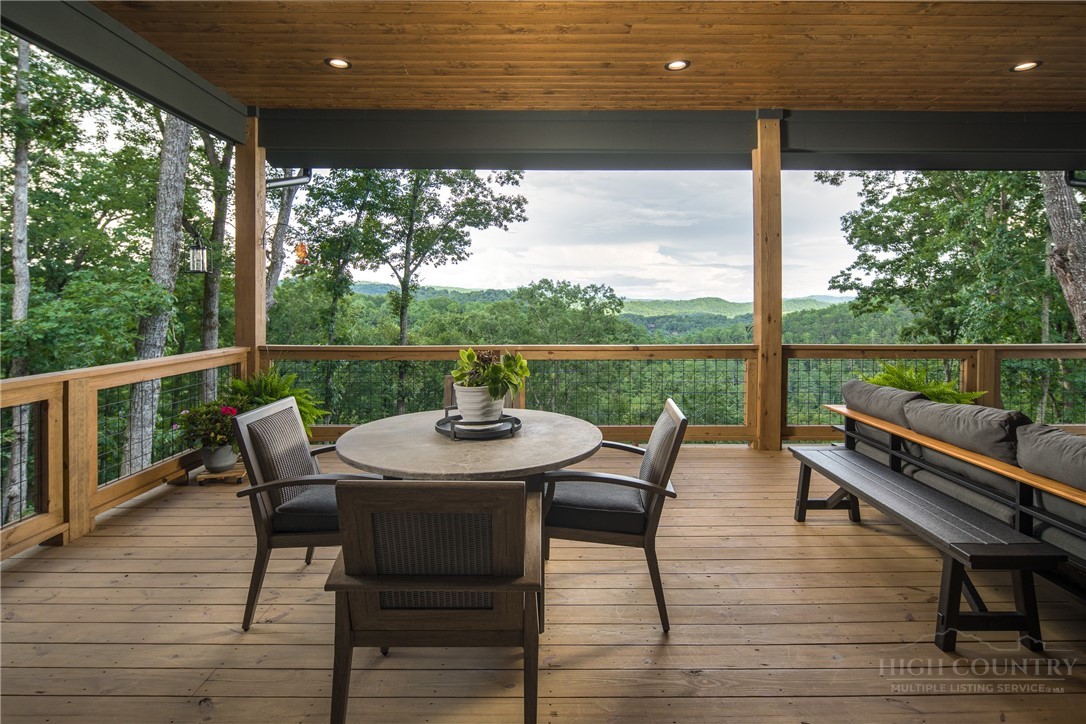 1236 Ninebark Road Boone, NC 28607 - Photo 13 of 50 a view of back yard from deck having patio