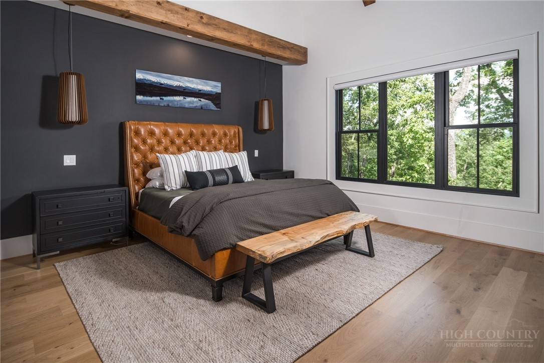 1236 Ninebark Road Boone, NC 28607 - Photo 17 of 50 a bedroom with a bed and window