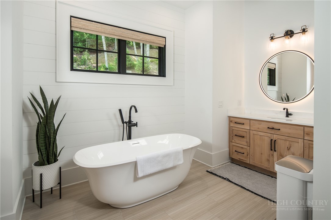 1236 Ninebark Road Boone, NC 28607 - Photo 20 of 50 a bathroom with a sink and a mirror