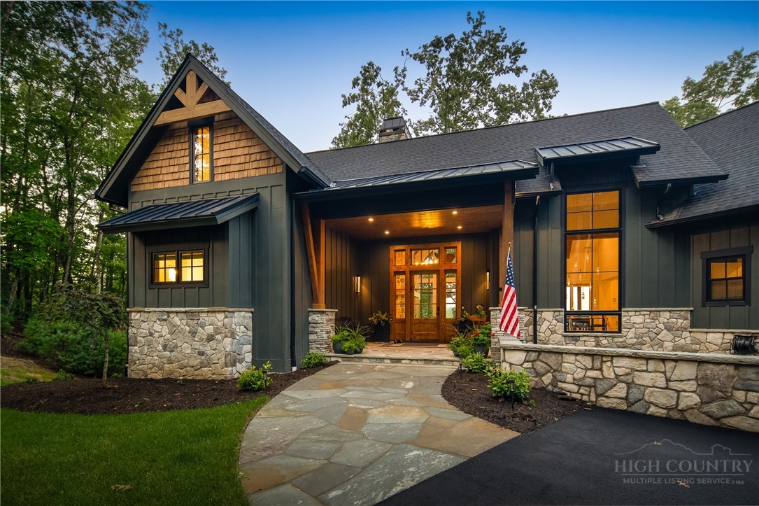 1236 Ninebark Road Boone, NC 28607 - Photo 44 of 50 a front view of a house with a yard