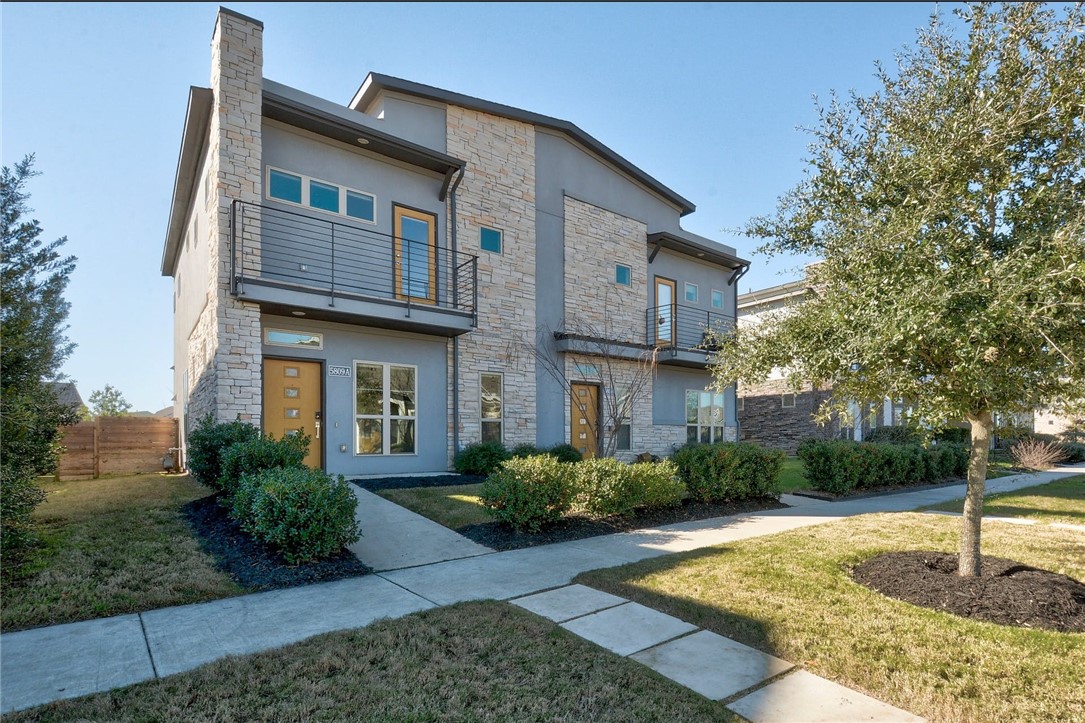 a house view with a garden space