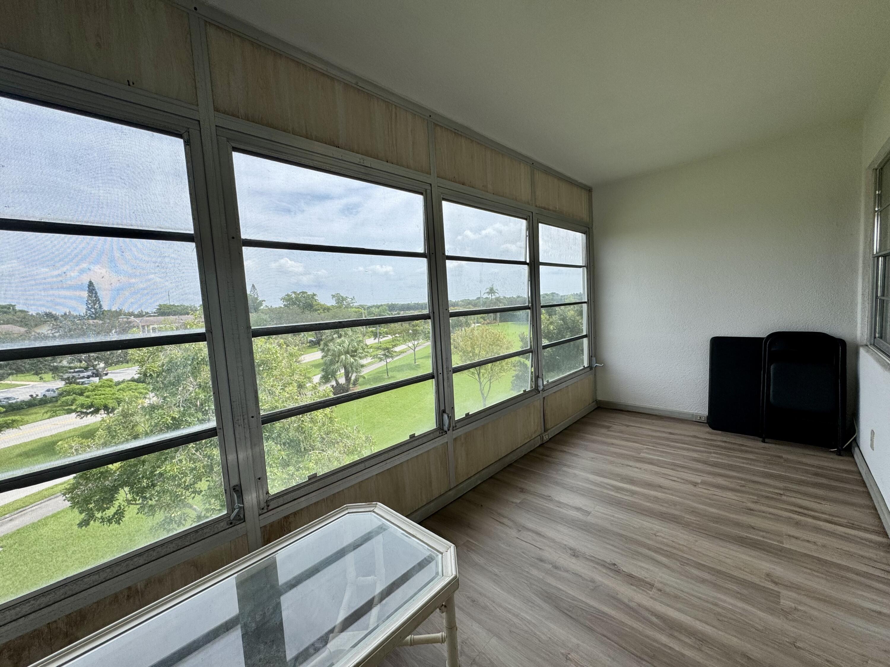 4019 Lincoln A Boca Raton, FL 33434 - Photo 26 of 36 a view of front door with wooden floor