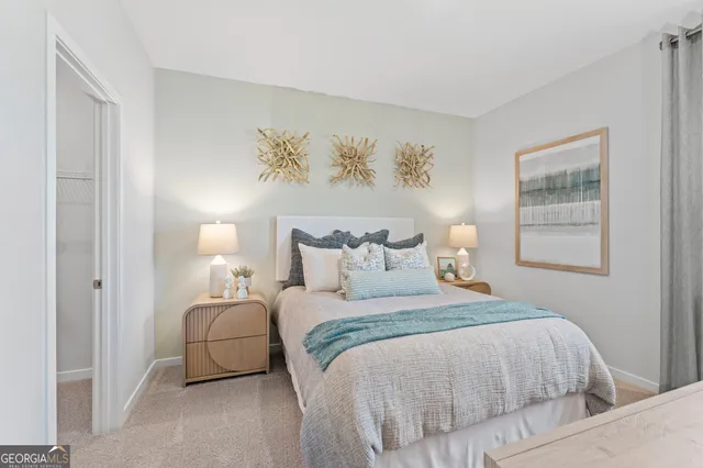 a kitchen with stainless steel appliances a refrigerator stove microwave and cabinets