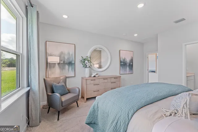 an aerial view of a house with a outdoor space