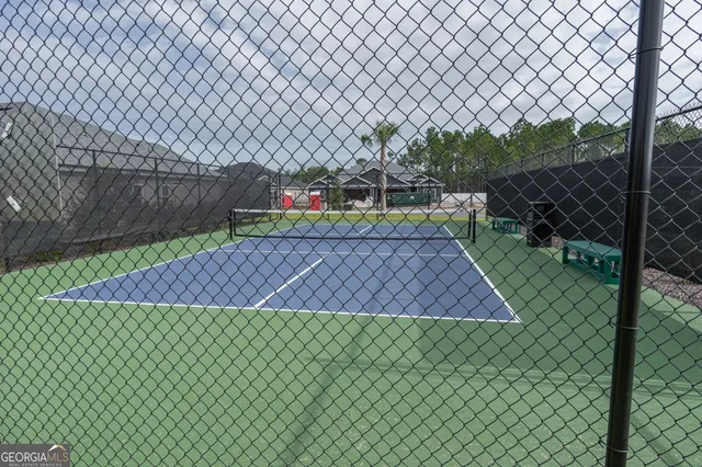 a view of a house with a park