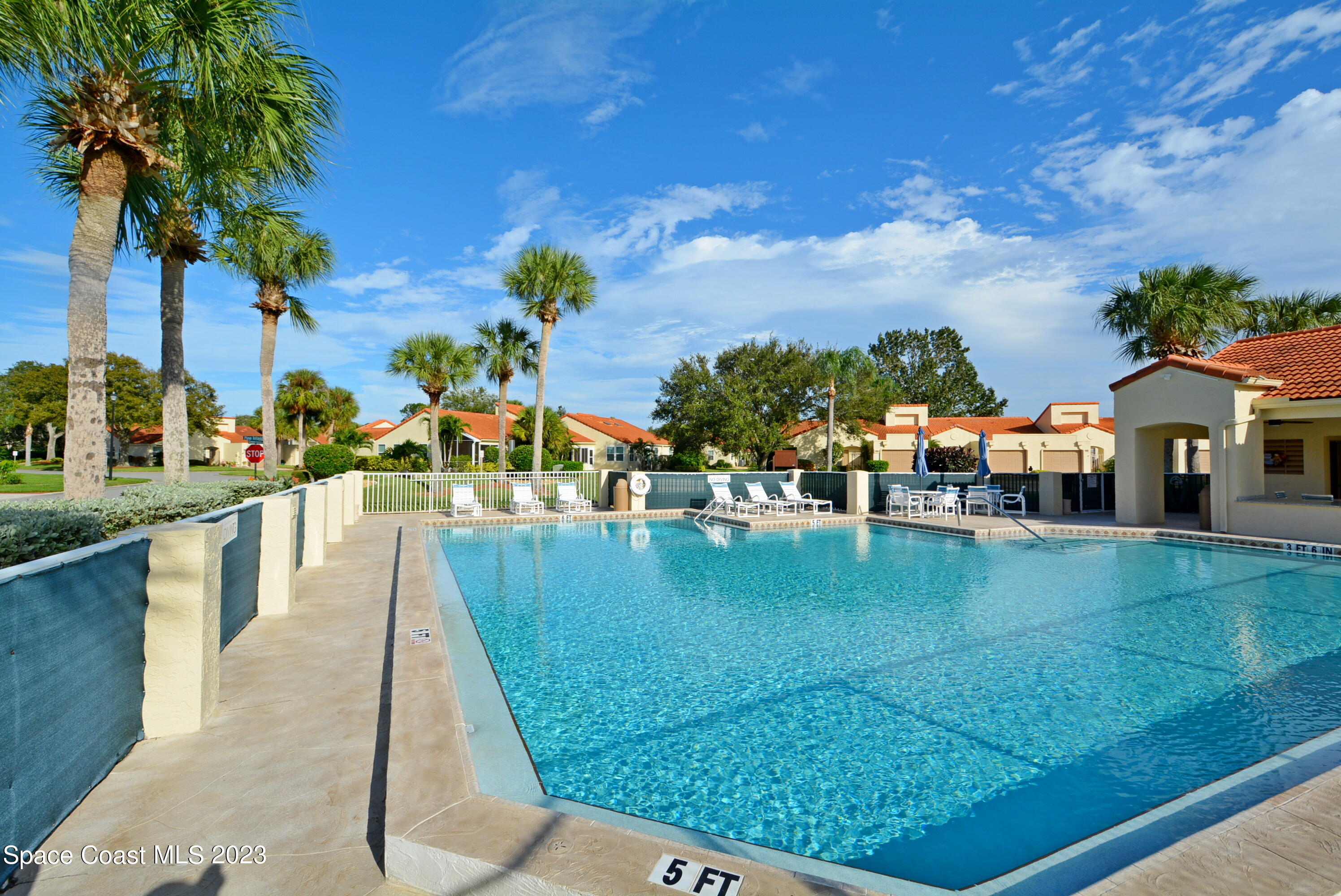 738 Green Valley Lane Melbourne, FL 32940 - Photo 6 of 40 swimming view with swimming pool and lake view