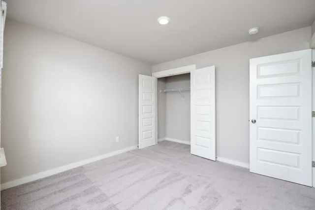 an empty room with a closet