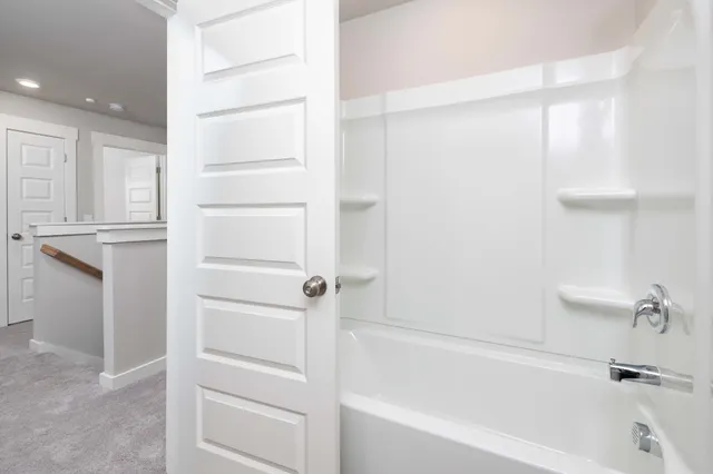 a bathroom with a bathtub