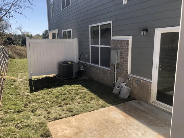 a view of a door and chair in the house
