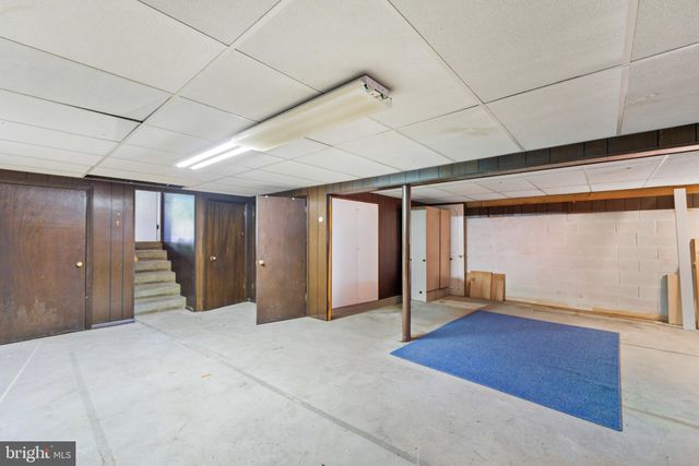 a view of house with yard