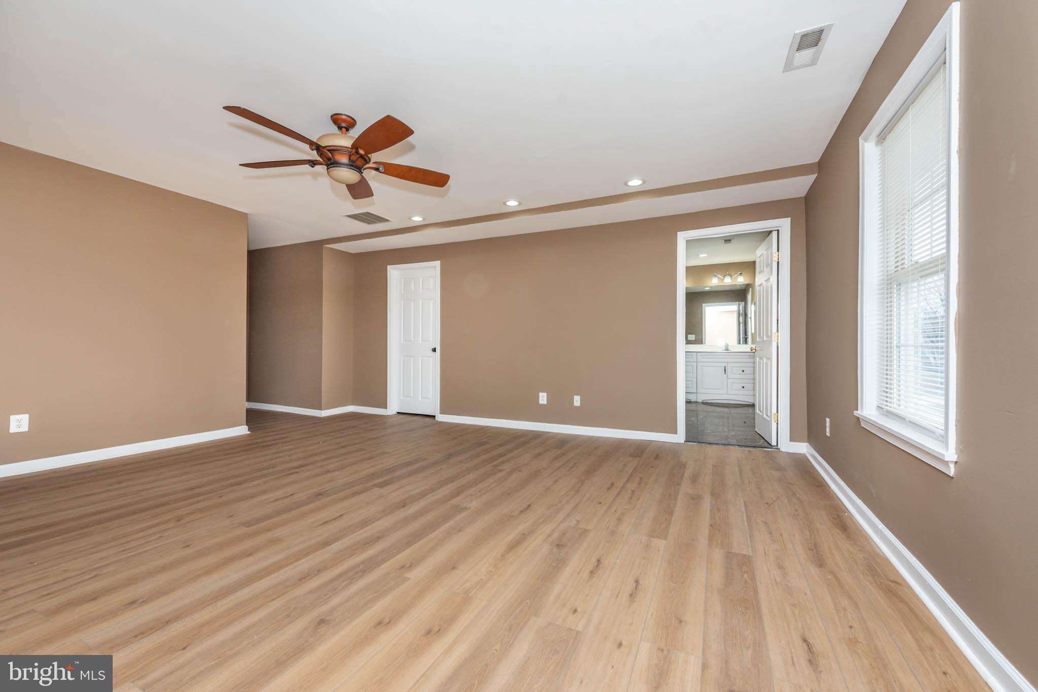 4021 Barrington Road Baltimore, MD 21207 - Photo 27 of 50 a view of a livingroom with a window