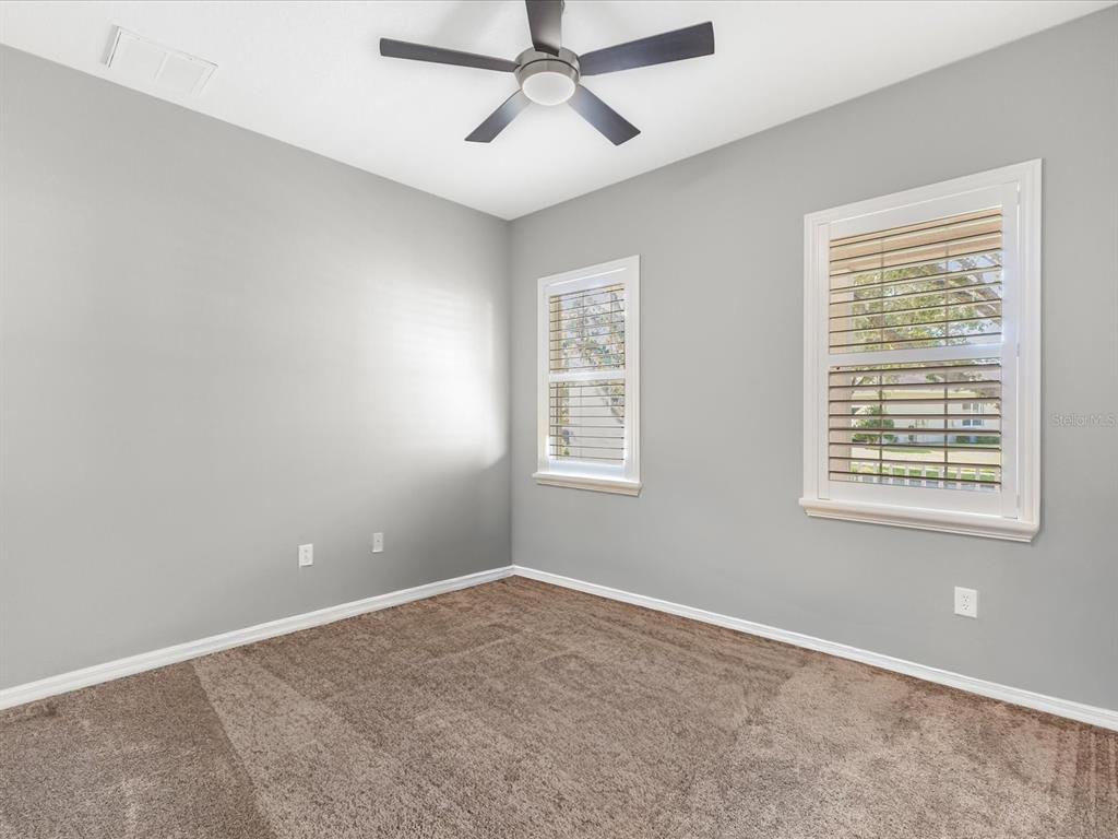 5347 Cappleman Loop Brooksville, FL 34601 - Photo 16 of 28 a view of an empty room with a window