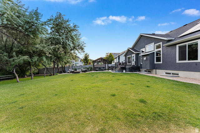 313 Old Maple Road South Weber, UT 84405 - Photo 31 of 35 Expansive green lawn providing ample outdoor space