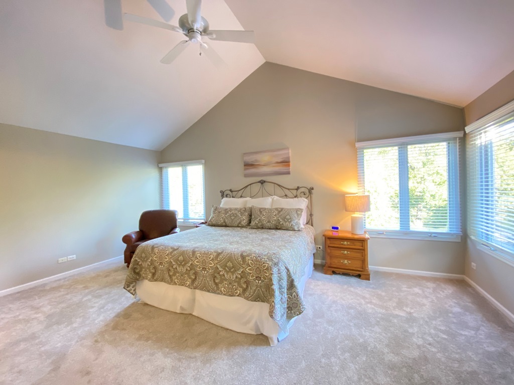 2428 Ridgewood Court Aurora, IL 60502 - Photo 15 of 39 a bedroom with bed and window