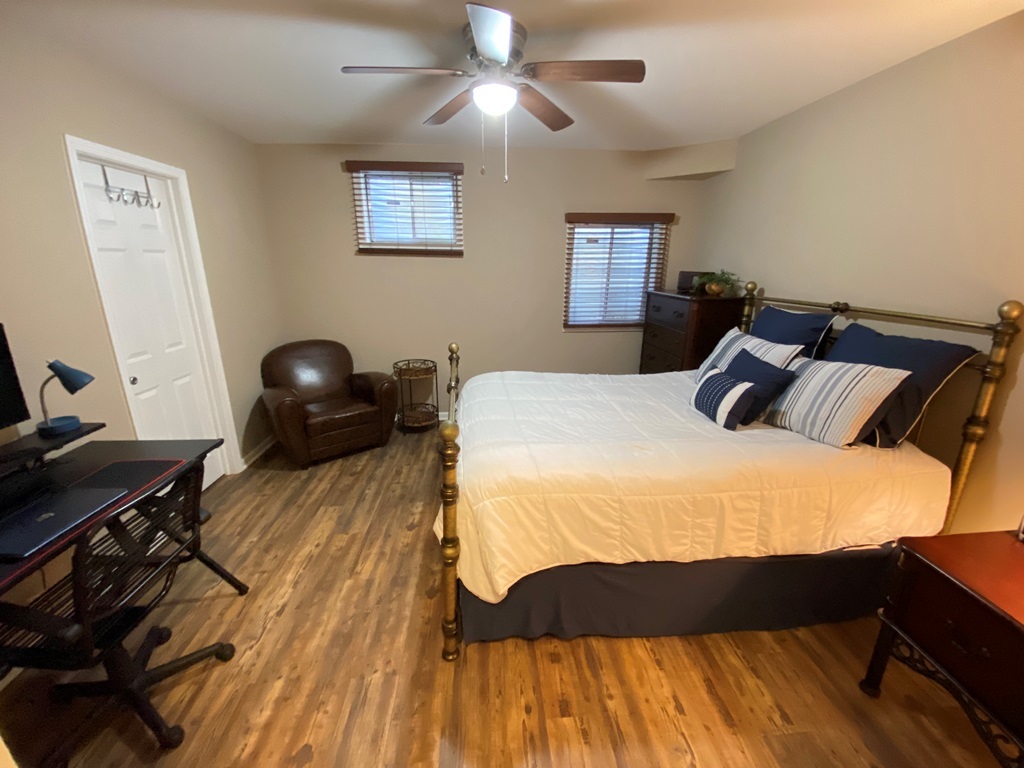 2428 Ridgewood Court Aurora, IL 60502 - Photo 27 of 39 a bedroom with a bed and a desk