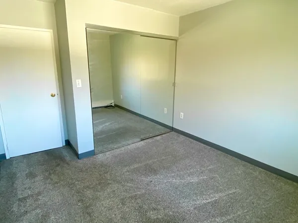 an empty room with closet