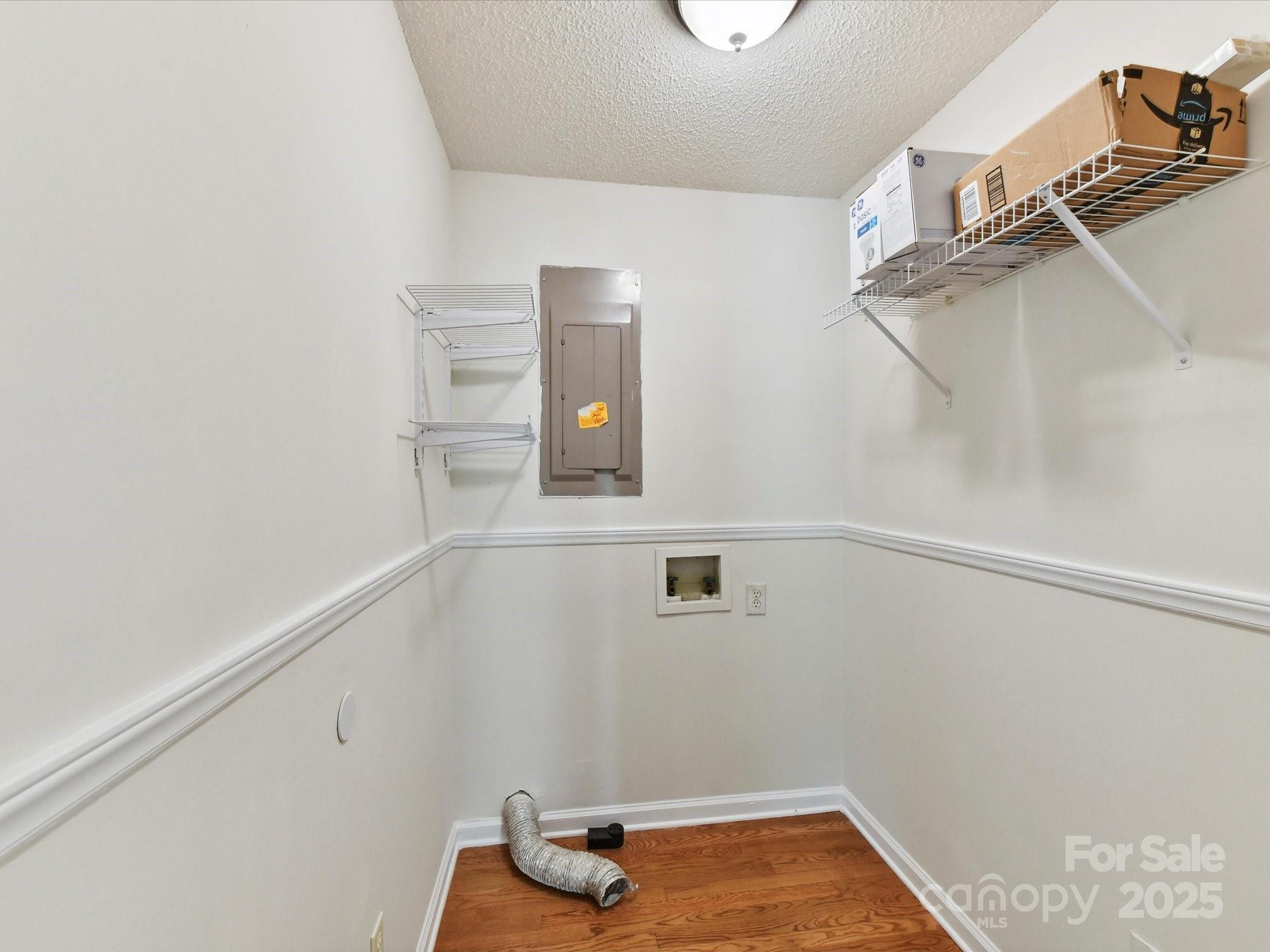 915 Gate Road Monroe, NC 28112 - Photo 20 of 46 a view of small space with racks on the wall