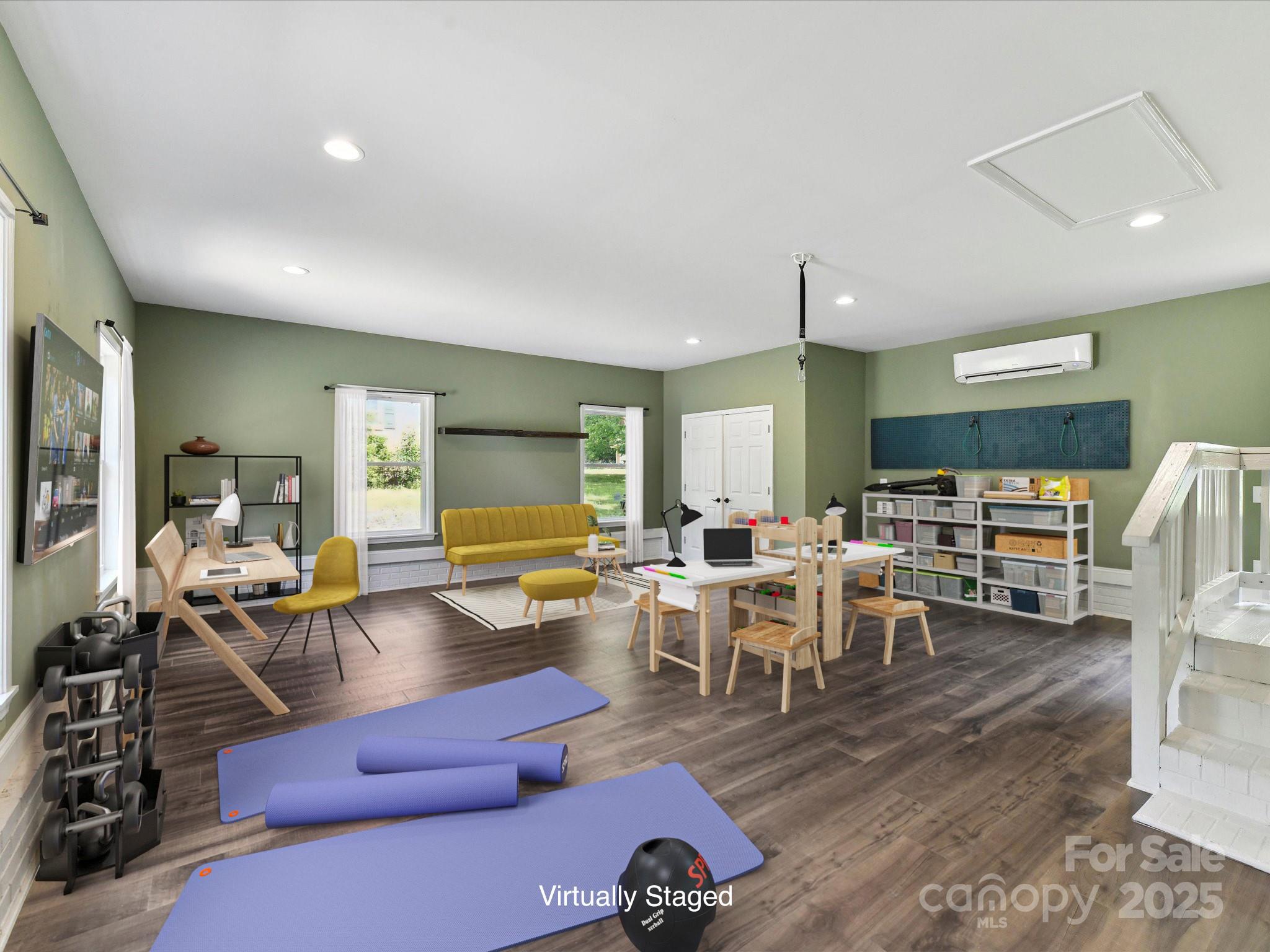 915 Gate Road Monroe, NC 28112 - Photo 21 of 46 a living room with lots of furniture and a wooden floor