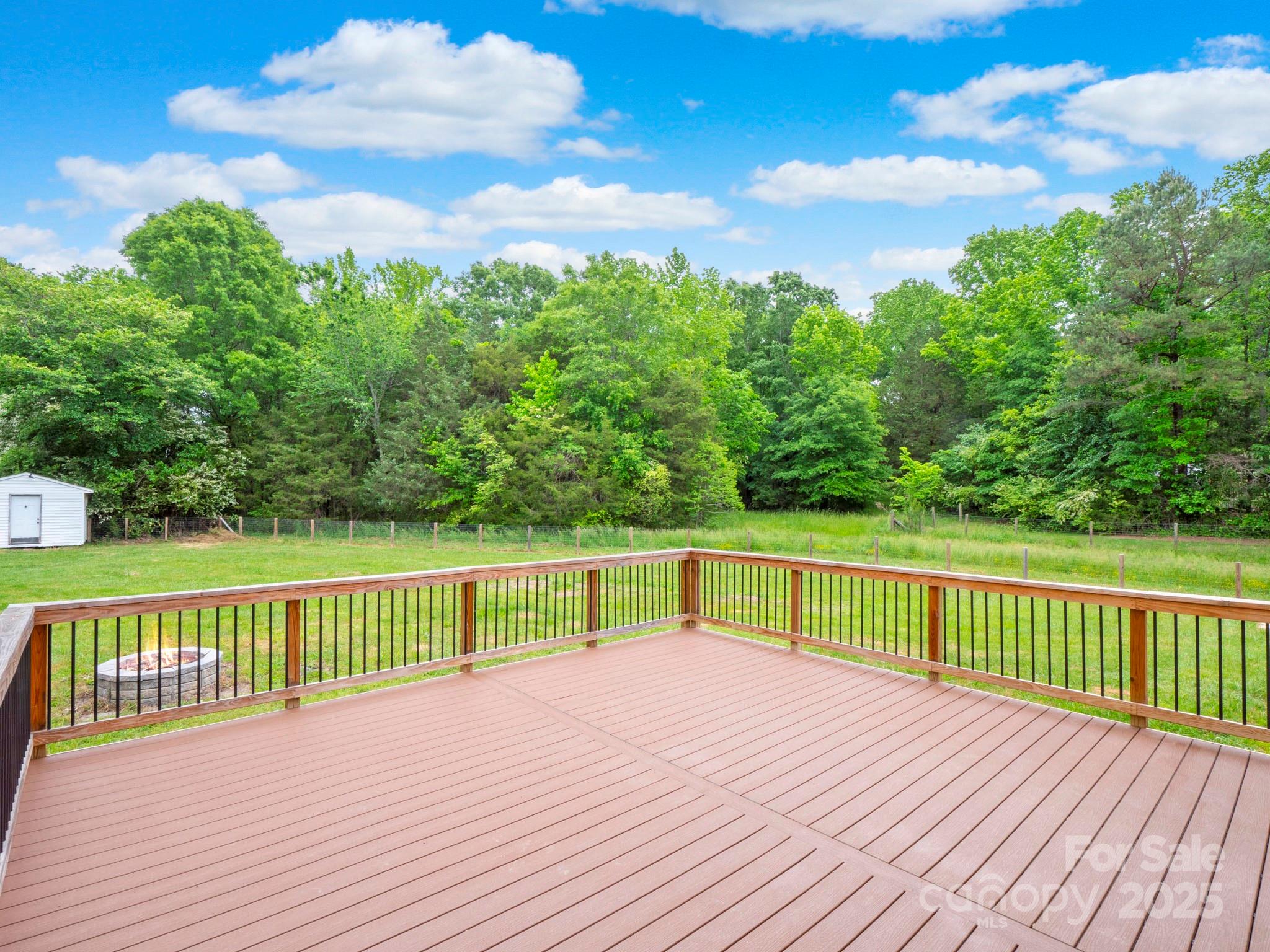 915 Gate Road Monroe, NC 28112 - Photo 32 of 46 a view of a terrace with trees