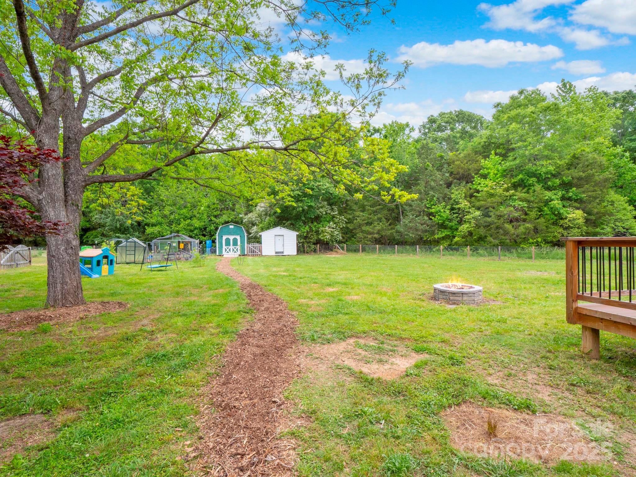 915 Gate Road Monroe, NC 28112 - Photo 34 of 46 a view of an outdoor space and a yard