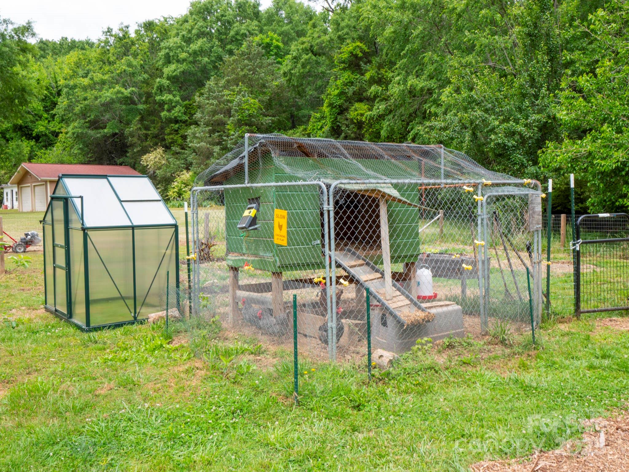 915 Gate Road Monroe, NC 28112 - Photo 36 of 46 a view of a chair and table in the garden