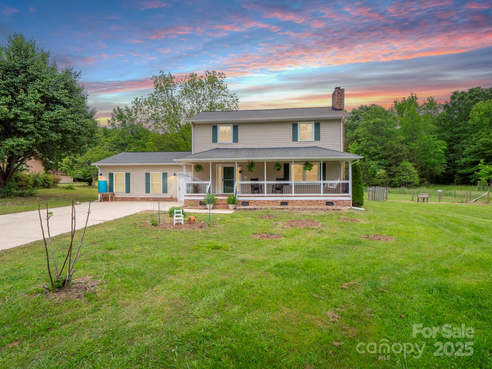 915 Gate Road Monroe, NC 28112 - Photo 45 of 46 a house view with a garden space