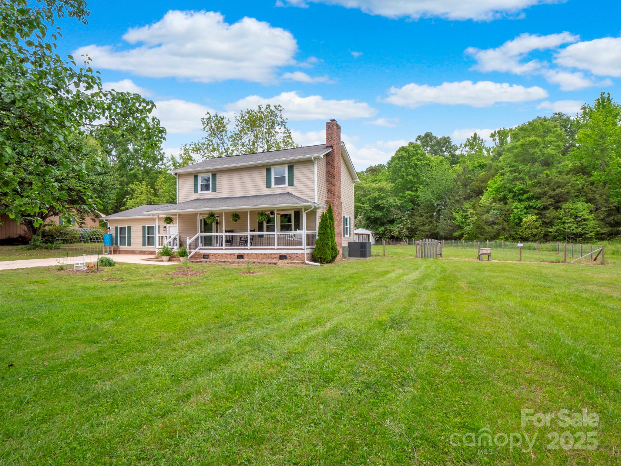 915 Gate Road Monroe, NC 28112 - Photo 46 of 46 a view of a house with a big yard