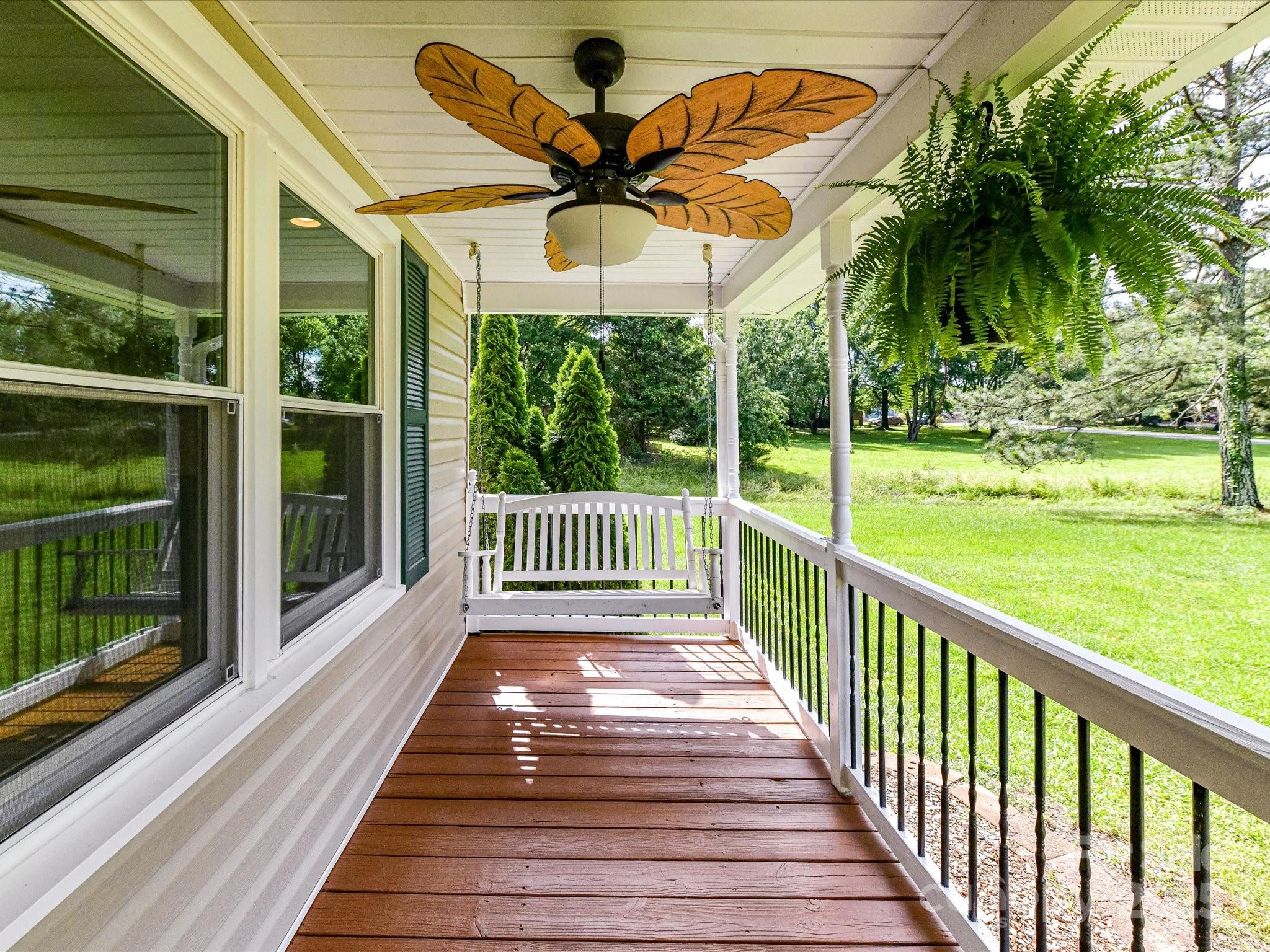 915 Gate Road Monroe, NC 28112 - Photo 5 of 46 a view of a patio with a table and chairs