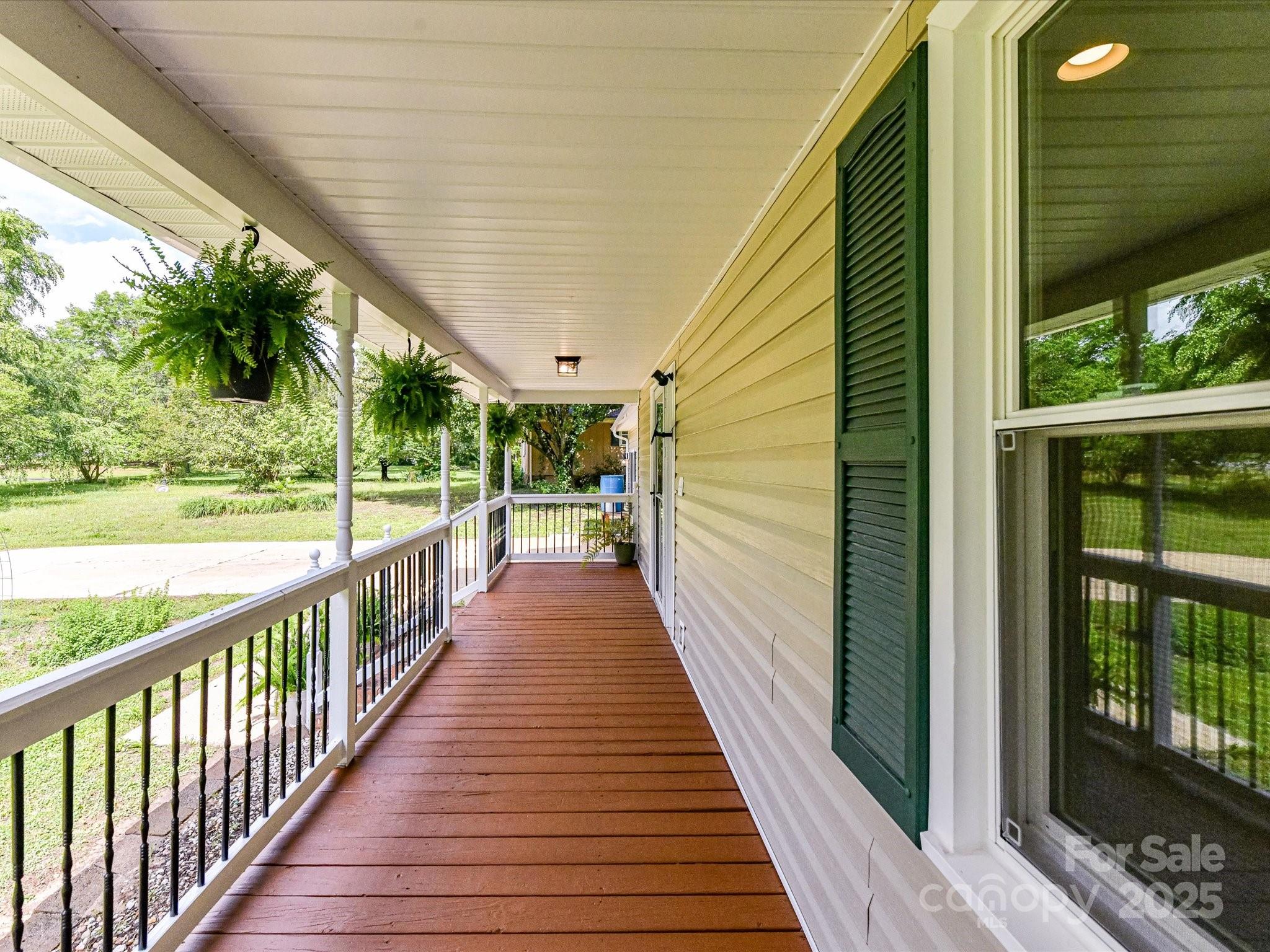 915 Gate Road Monroe, NC 28112 - Photo 6 of 46 a view of a porch with wooden floor